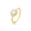 Anel Halo Cristal com pedra central redonda, zircônias brancas e banho de ouro 18k